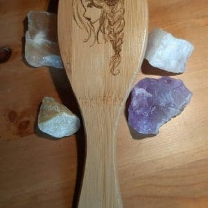 Haarbürste mit Mädchenkopf